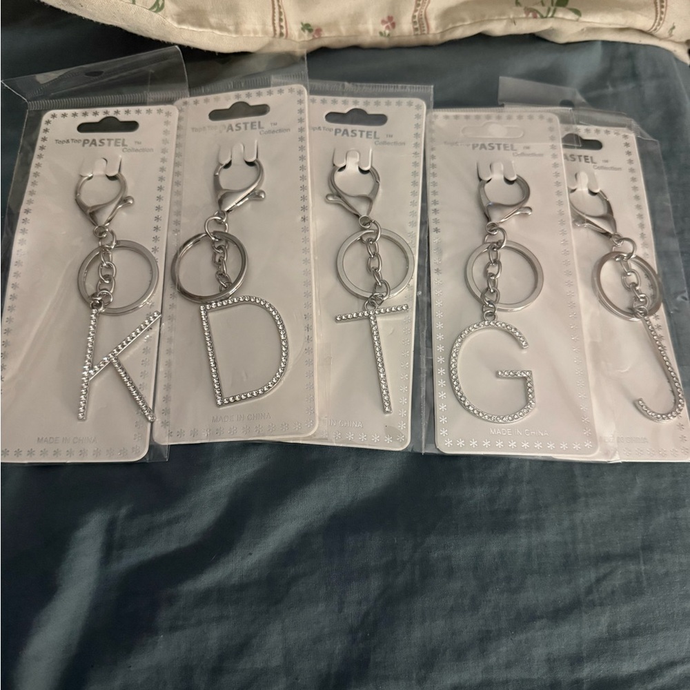 Silver initial bag charms/key chain T, D, J, G, K